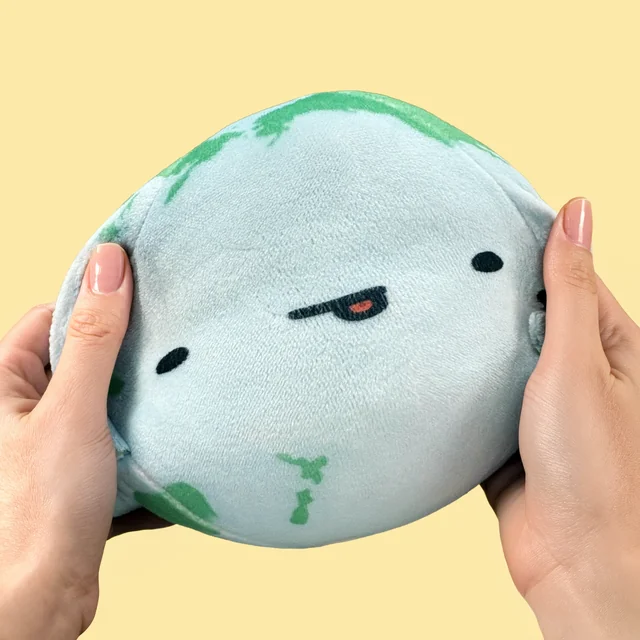 Endearing Earth held round in two hands